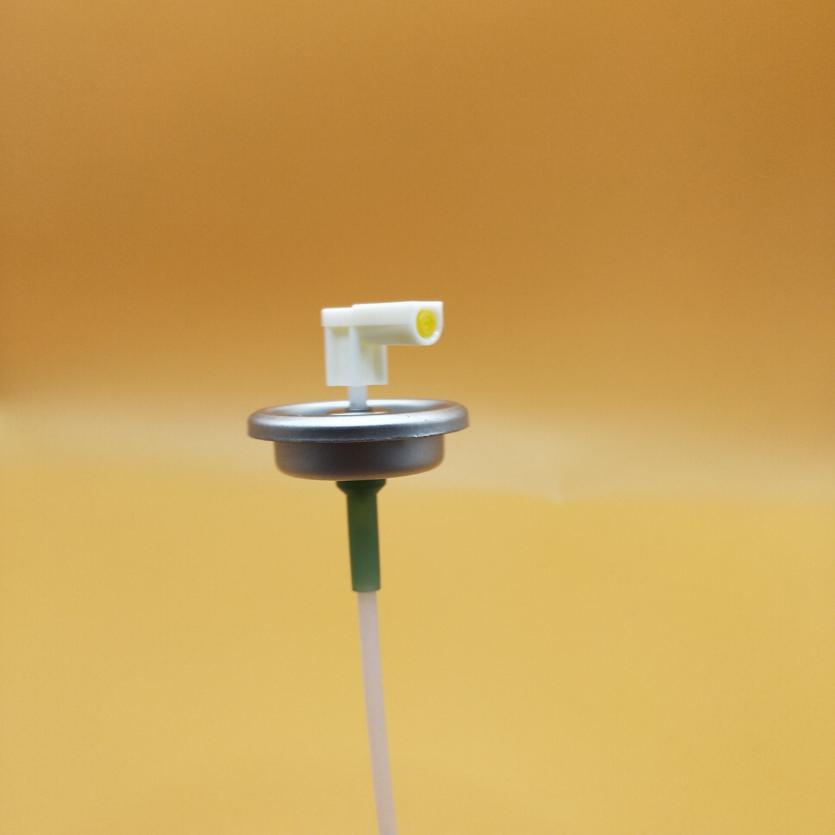 metered spray valve (64)